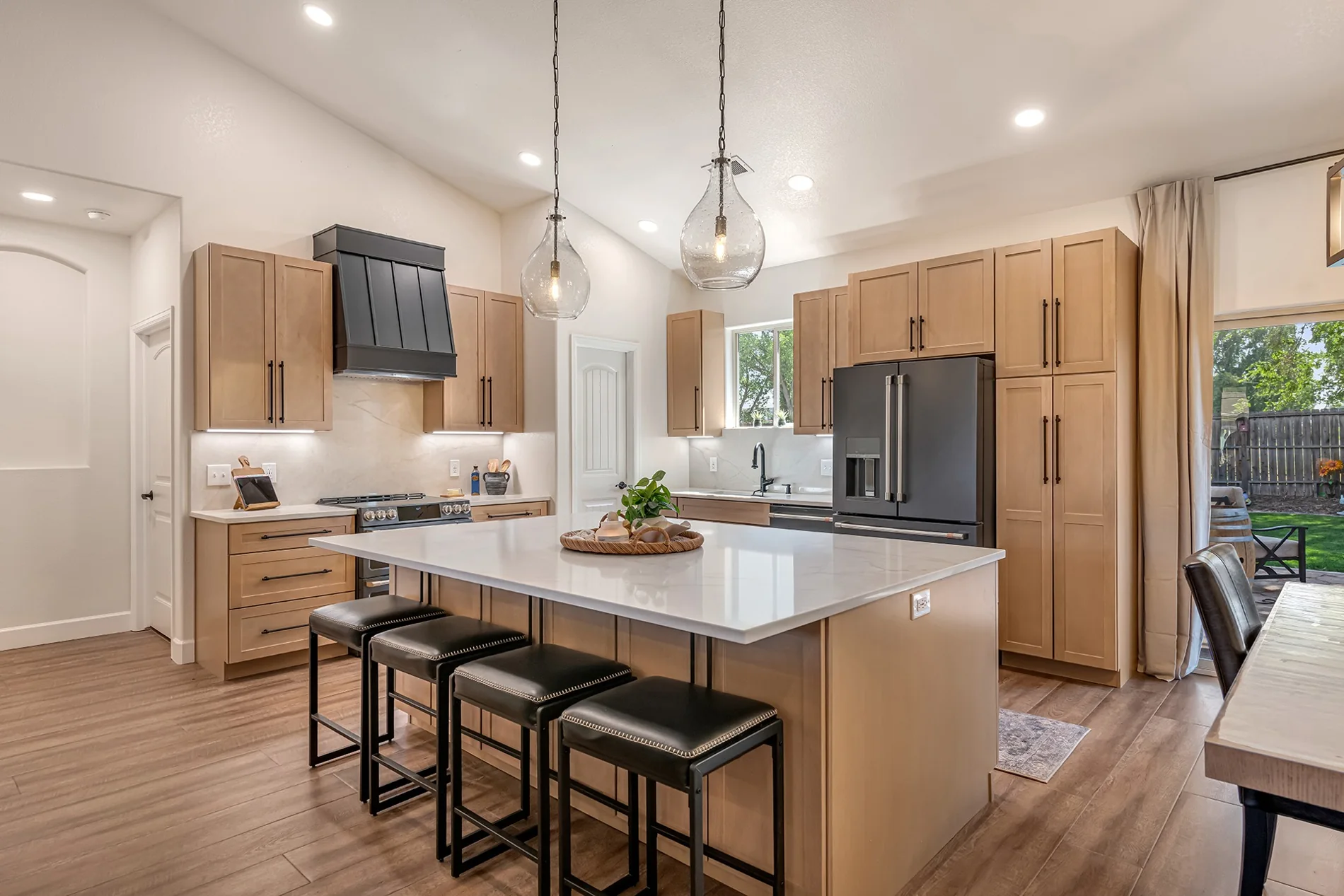 Warm, welcoming renovated kitchen with a generous island